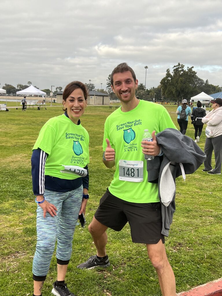 Two Honored Colorectal Cancer Survivors Wearing the Bright Green Survivor Shirts